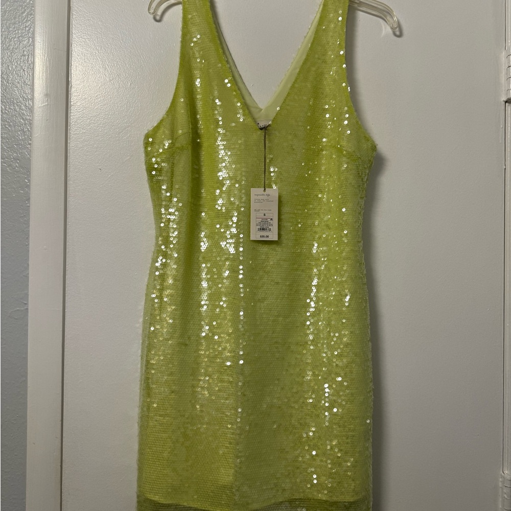Brand new green sequined dress. Perfect for a concert or party
